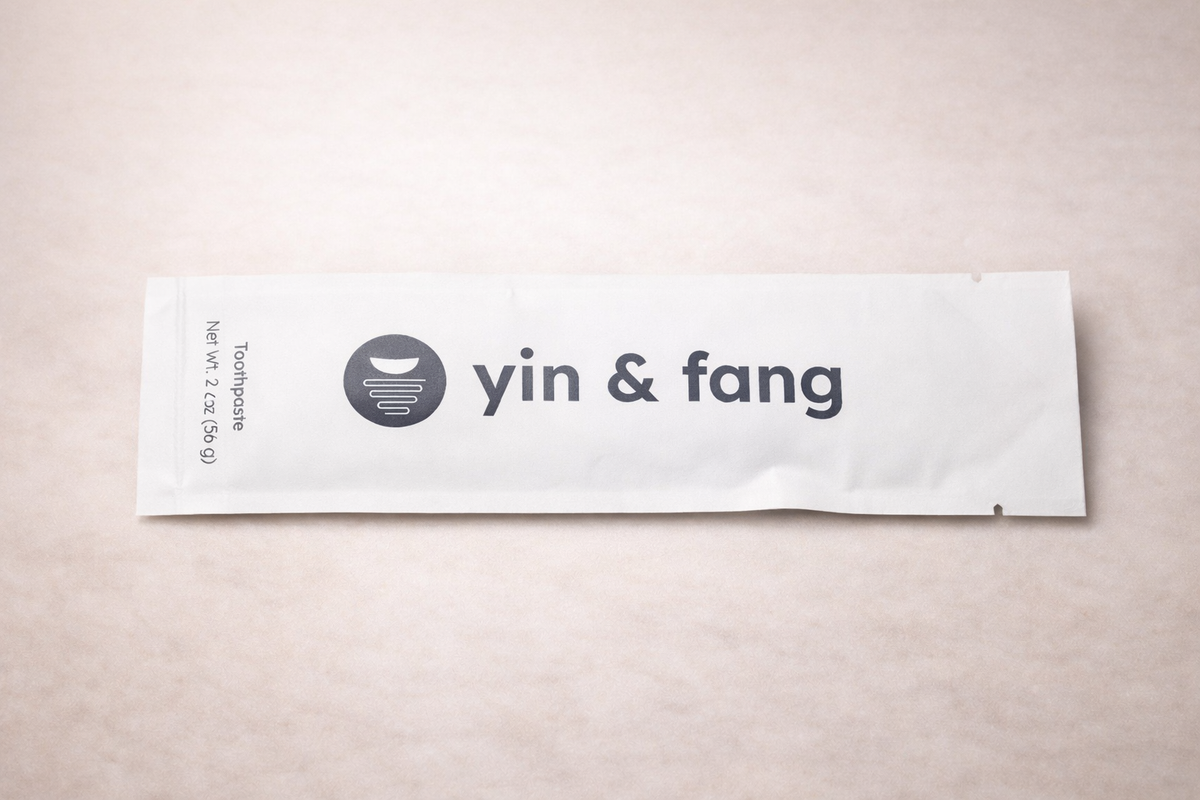2oz compostable refill packet of Yin & Fang oral microbiome toothpaste
